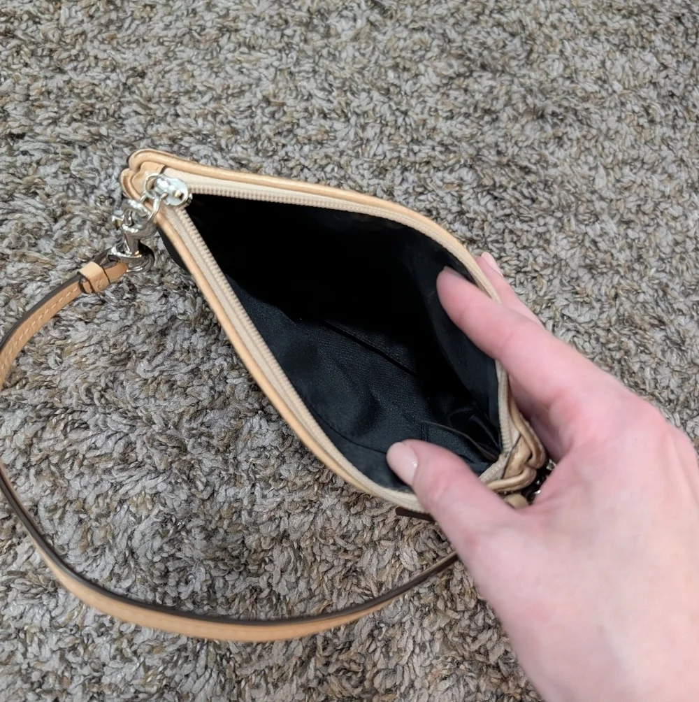 Coach Black and Tan Wristlet with Red Tag